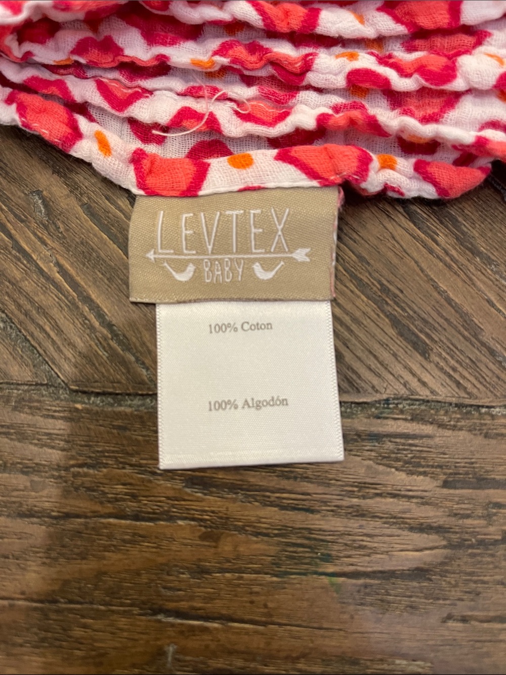 Levtex Muslin Baby Blanket with Pink and Orange Pattern - Picture 2 of 2